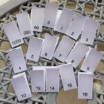50PCS White Satin Size Label 0000 000 00 0 1 2 3 4 5 6 7 8 9 10 12 14 16 Print Center Fold Garment Sizing Labels (New)