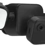 Blink Outdoor 4 Floodlight Camera ” Wireless smart security camera 700 lumens two-year battery life enhanced motion det (New)