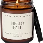 Sweet Water Decor Hello Fall Candle 9oz Amber Jar Autumn Scents for Home Hot Cider Cinnamon Cloves &amp Nutmeg Soy Wax (New)