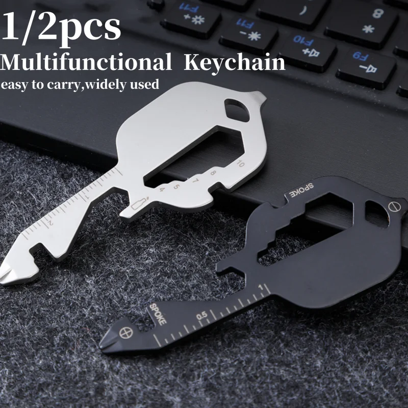 S16bacffefed64cc4ad56f6e1195c2924X 1 2 Mini Multifunctional Keychain Stainless Steel Portable Key Shaped Multitool Screwdriver Bottle Opener (New) - Image 1