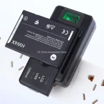 Universal LCD Battery Charger with USB Port, 32 55mm Adjustable, For Cell Phone & (New)