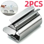 1 2 Toothpaste Squeezer Tube Roller Stainless Steel Wringer Roller Rotate Dispenser for Cosmetics (New)