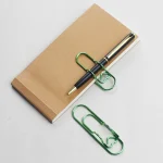 Multifunctional Metal Paper Clip with Integrated Pen Holder for Notebooks School and Office (New)