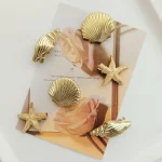 6 Fashion Golden Ocean themed Hair Clips with Shell Conch Starfish Shapes for (New)