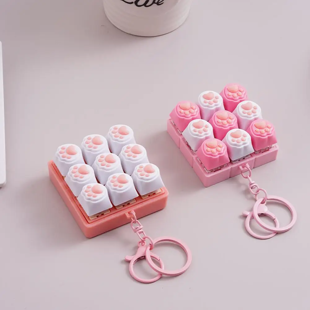 Sa5883d54b0384f10b471aa941c8d595d7 Cute Cat Claw Keychain 9 Keys Keyboard Decompression Toys DIY Keyboard Keychain Toys (New) - Image 1